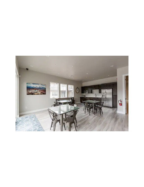 Dining room featuring baseboards and light wood-style flooring