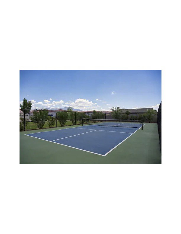 View of tennis court featuring community basketball court