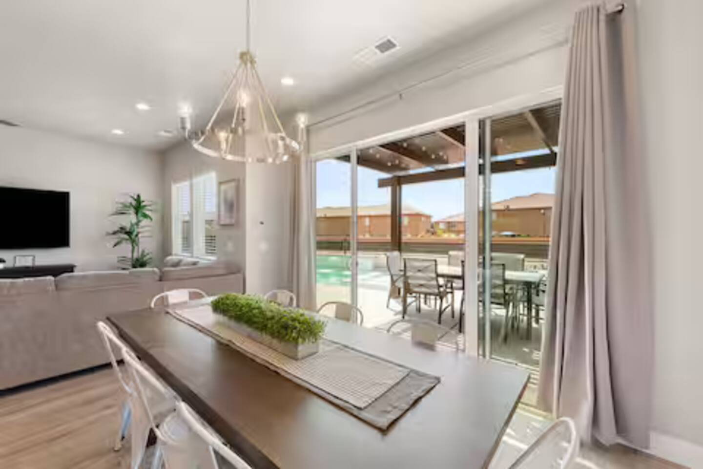 Dining room with a chandelier, recessed lighting, and light wood finished floors