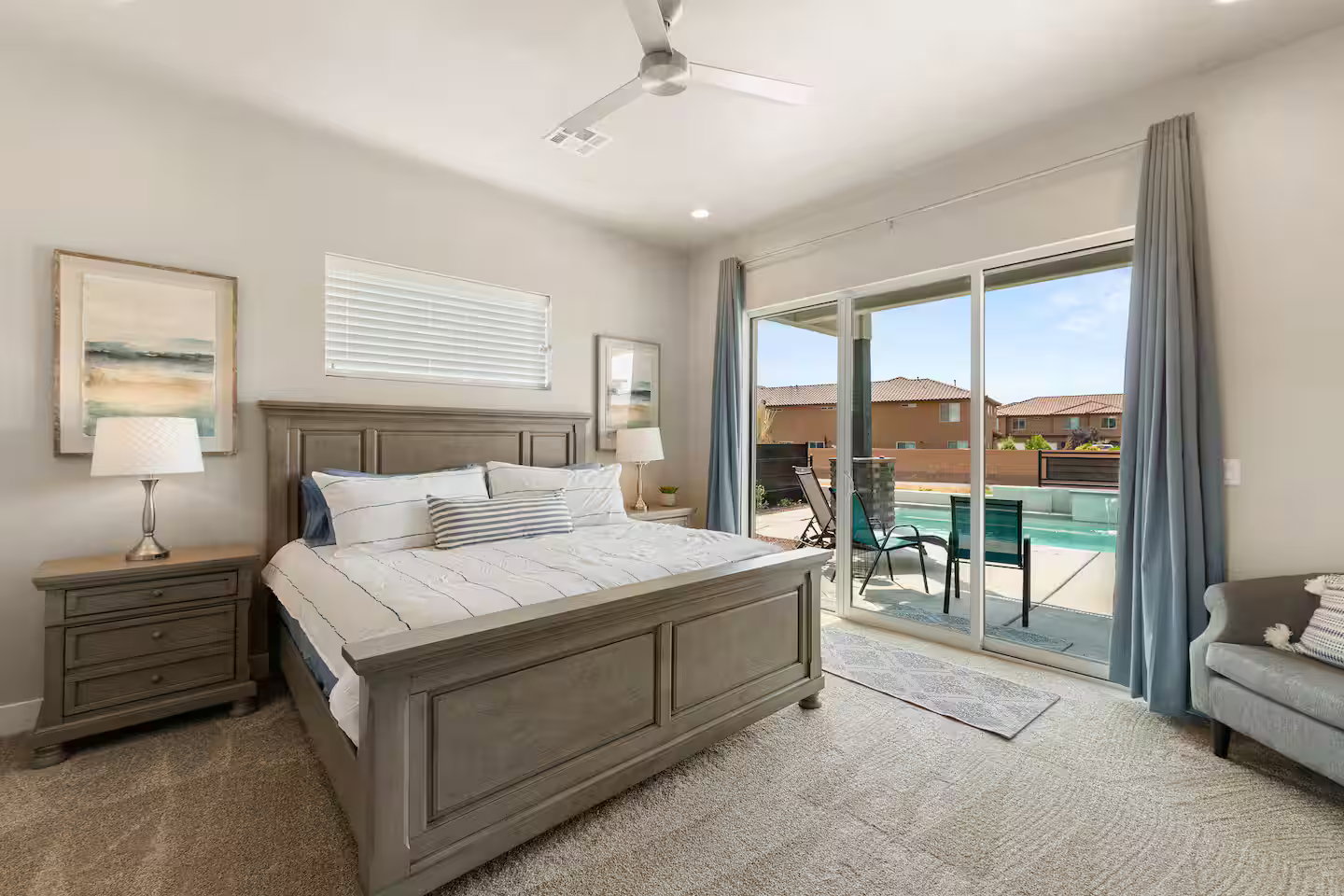 Carpeted bedroom featuring a ceiling fan, recessed lighting, and access to outside