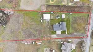 Aerial overview of property's location featuring property boundaries highlighted