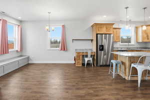 All main floor living ADU adjacent, yet separate from the main house only sharing via the garage