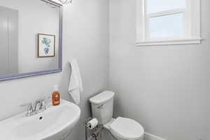 Bathroom with a sink and toilet