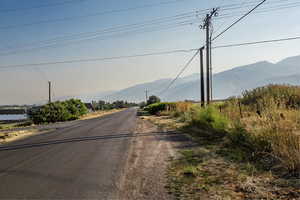 View of asphalt street with a mountain view