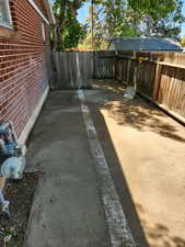 View of fenced backyard