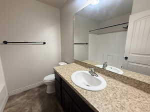 Bathroom featuring vanity, a shower, and a tub to relax in