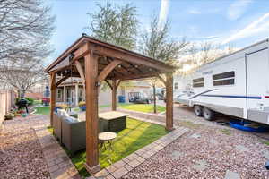 View of patio / terrace featuring a gazebo and grilling area