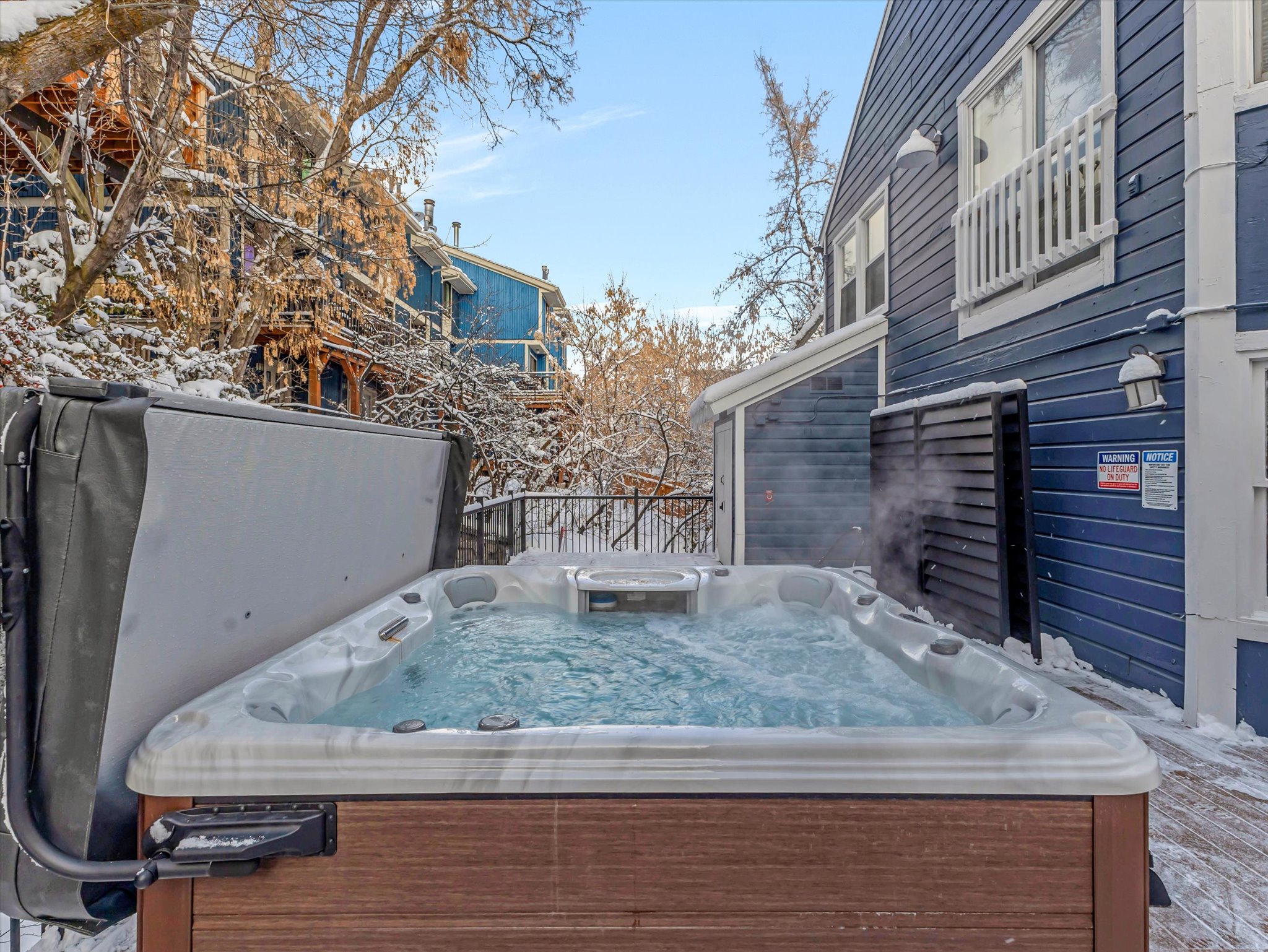 Wooden deck with a hot tub