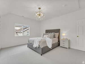 Carpeted bedroom featuring baseboards