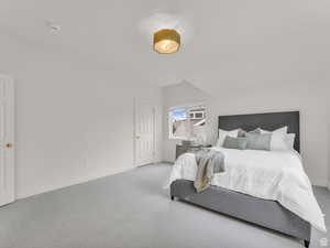 Bedroom featuring carpet floors