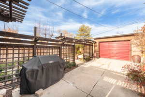 Garage with concrete driveway