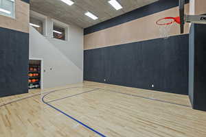View of basketball court featuring basketball hoop