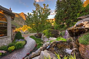 Yard at dusk with a mountain view