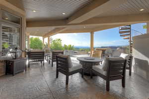 View of patio / terrace with an outdoor living space and stairway
