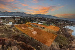 Aerial view at dusk of a water and mountain view