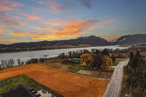 Aerial view at dusk of a water and mountain view