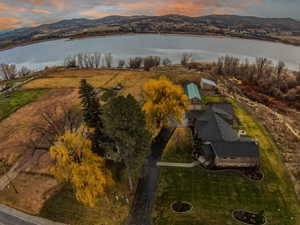 Aerial view at dusk of a water and mountain view