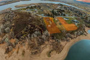 Aerial overview of property's location featuring a large body of water
