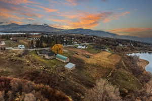 Aerial view at dusk of a water and mountain view