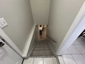 Stairway with tile patterned flooring