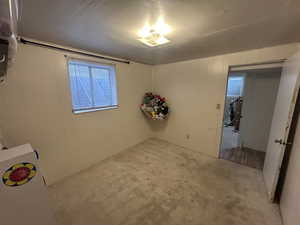 Empty room featuring wood walls