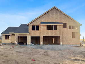 Rear view of property featuring a patio area and stucco siding