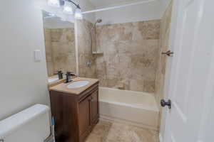 Full bathroom with vanity and shower / bath combination