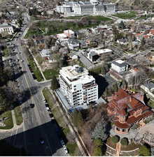 Aerial view of property's location with nearby urban area