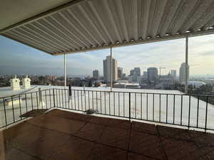 Balcony featuring a view of city