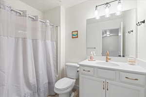Bathroom with vanity and toilet