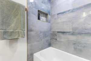 Full bath with a bath