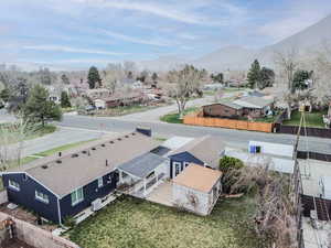 Aerial view of residential area featuring a mountain backdrop