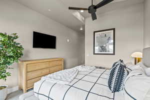 Bedroom with a ceiling fan, recessed lighting, and carpet flooring