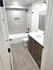 Full bathroom with vanity and shower / washtub combination