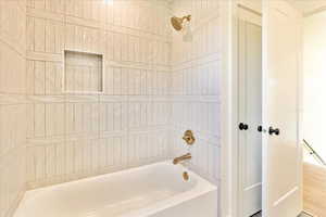 Full bathroom with  shower combination