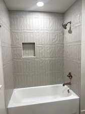 Bathroom with shower / tub combination