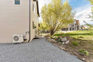View of home's exterior featuring a cooling unit