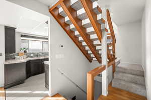 Staircase with wood finished floors