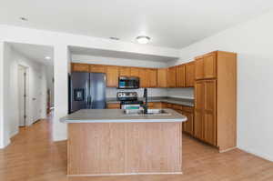 Kitchen with new refrigerator and microwave!