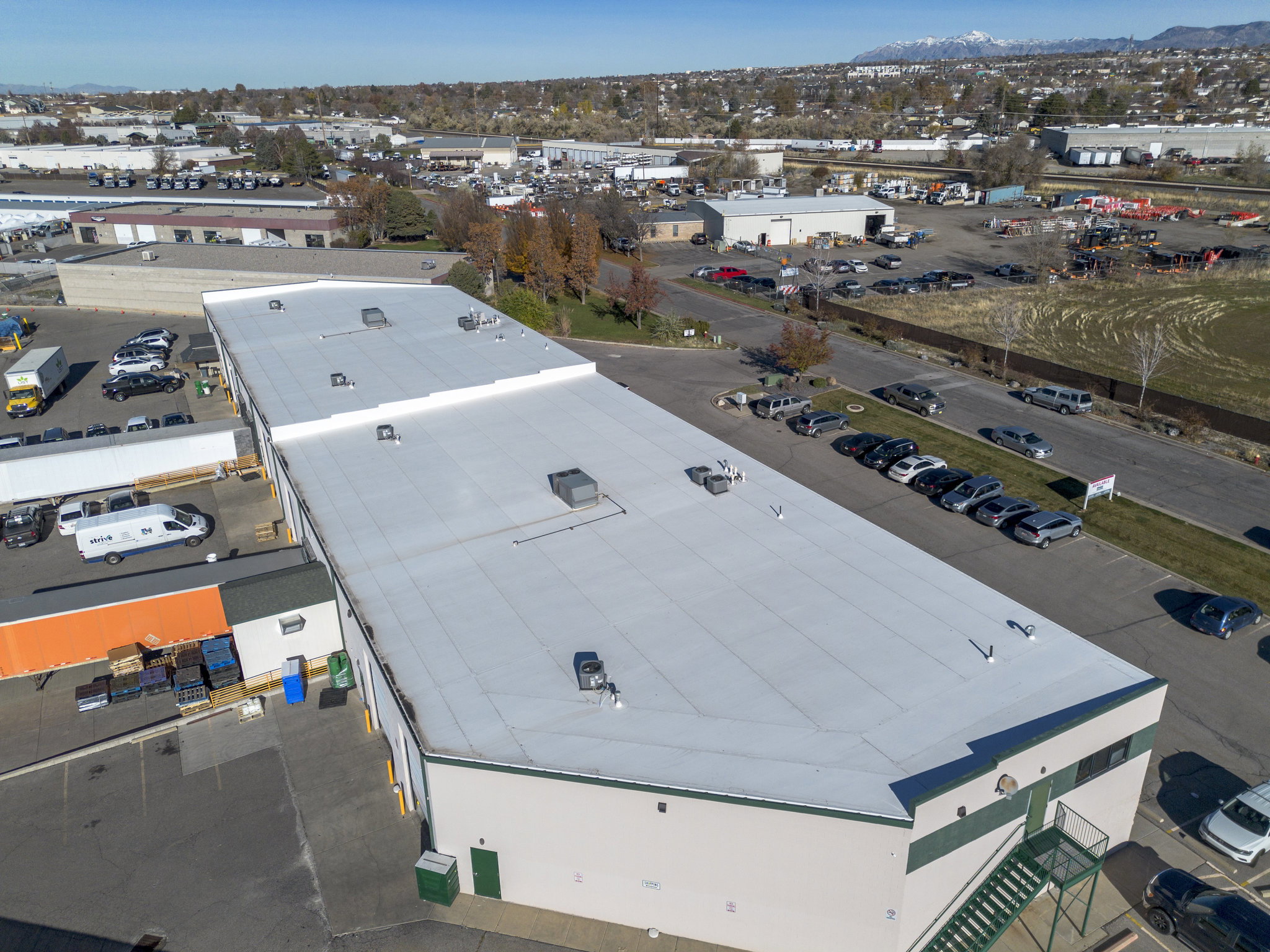 Aerial view of an industrial area and mountains