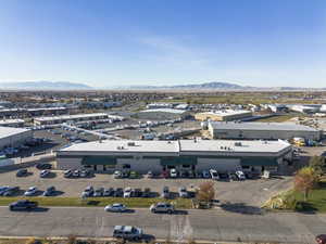 Bird's eye view of a mountainous background and industrial structures