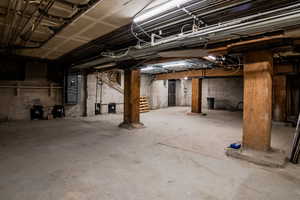 Unfinished basement with stairway