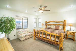Bedroom featuring recessed lighting, carpet floors, and ceiling fan