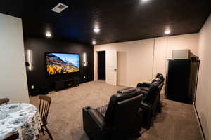 Home theater featuring carpet flooring