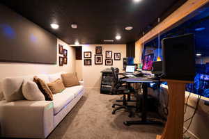 Carpeted office with recessed lighting