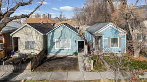 View of front of property featuring roof with shingles