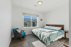 Bedroom featuring wood finished floors
