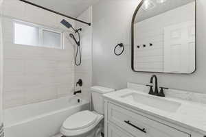 Full bathroom with  shower combination and vanity