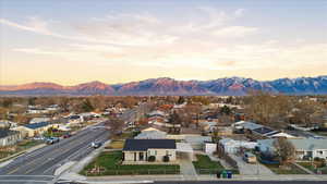 Aerial view at dusk of a residential view and a mountain view