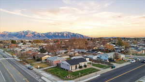 Aerial view at dusk of a residential view and a mountain view